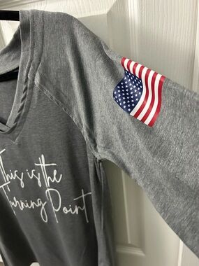Gray Long-Sleeve Top with American Flag Detail the turning point size small S